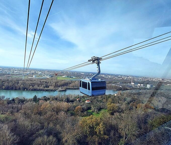 Toulouse Panorama, Electric Bike Ride and Cable Car - Taking the Urban Cable Car