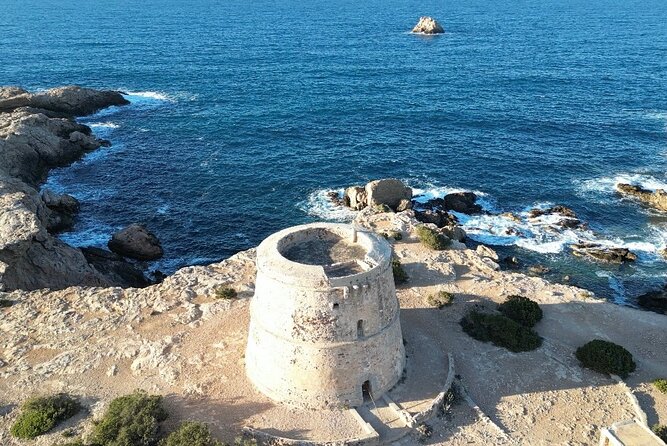 Tour in Seabob Secret Caves of Cala Bassa With Paella and Sangria - Indulging in Authentic Paella and Sangria