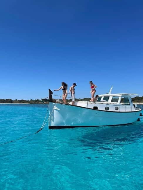 Traditional boat 10 beaches in the south of Menorca. Snorkeling, SUP and drinks - Exploring Menorca’s Hidden Coastlines by Traditional Boat