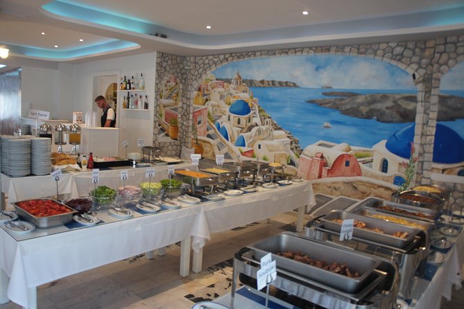 Traditional Greek Night Live Music & Dinner Show in Santorini - Meeting and Pickup