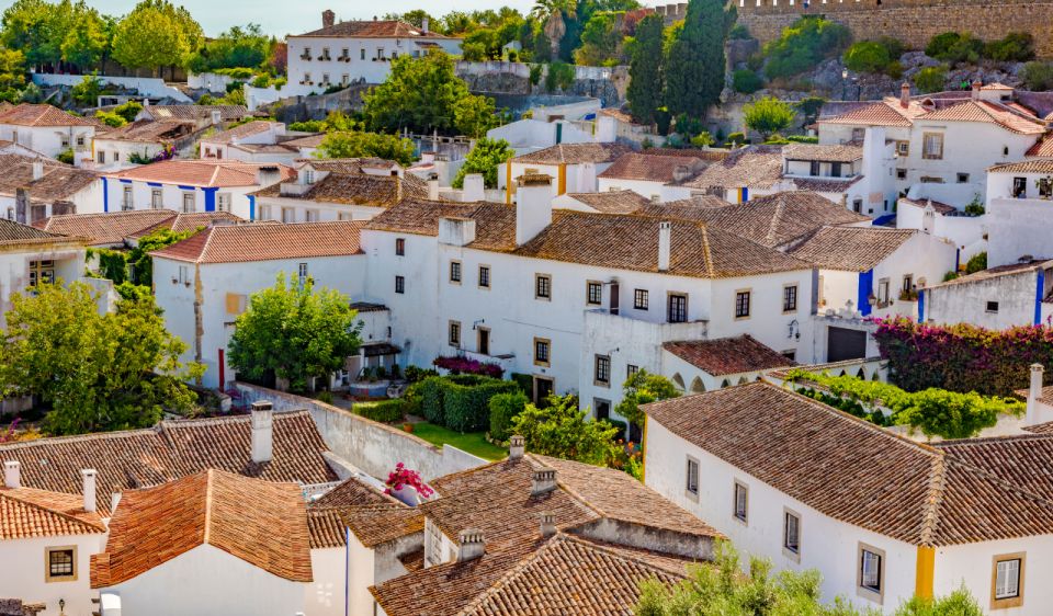 Transfer From Porto to Lisbon With 3 Stops in Aveiro, Nazaré/Fatima, and Obidos - Private Driver Provided