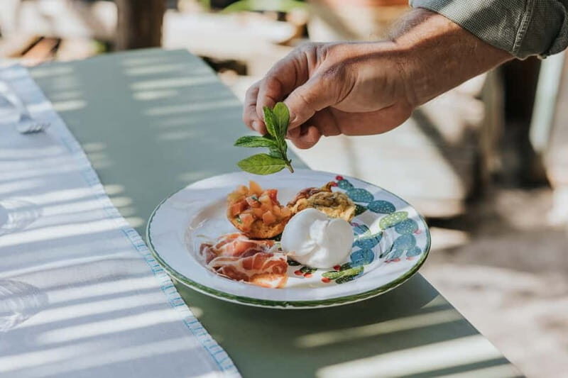 Typical Apulian dinner in the garden of an ancient Trullo - The Setting: A Garden of Peace and Beauty