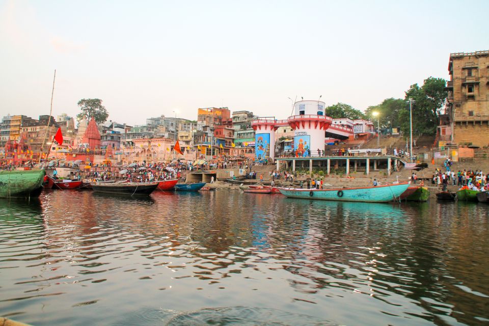 Varanasi: Morning Guided Boat Ride With Yoga - Key Points