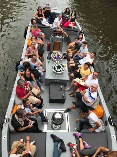 Visit Amsterdam by Boat with a French Guide (french) - The Experience: An Intimate, Informative Cruise