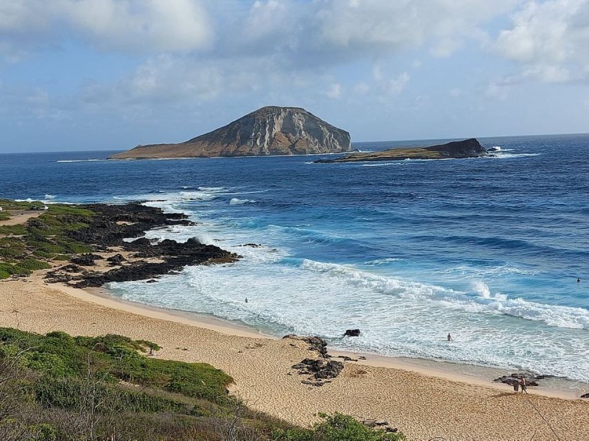 Waikiki: Guided Byodo Temple and Waimea Waterfalls Day Trip - Macadamia Nut and Pineapple Farms