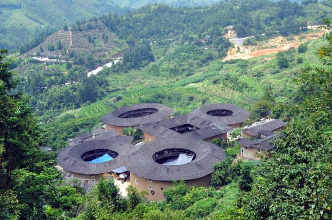 Xiamen: Nanjing Tianluokeng Hakka Cluster 1-Day Trip - Tour Guide Languages
