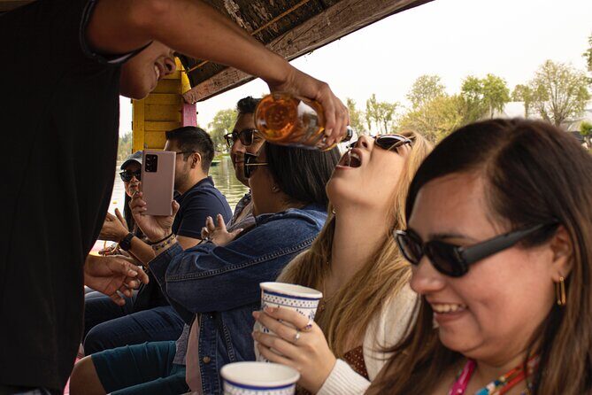 Xochimilco BOAT LIGHT PARTY WITH 1 DRINK AND 4 TAQUITOES + 18 - The Sum Up