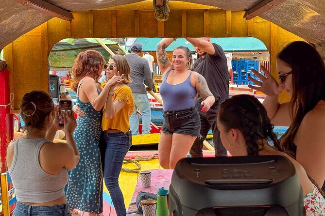 Xochimilco International boat party with open bar and tacos - Key Points